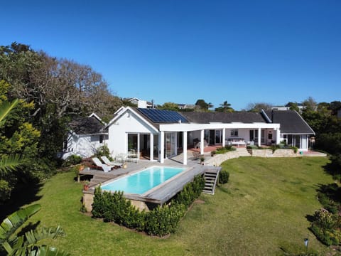 Expansive garden and pool area
