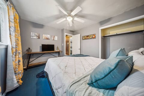 Gemini said Brighten your stay in this cheerful bedroom, complete with a cozy queen-sized bed, vibrant yellow accents, and a private TV for your entertainment.