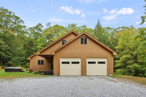 Welcome to your home away from home, complete with hot tub, secluded setting, and direct access via private garage.