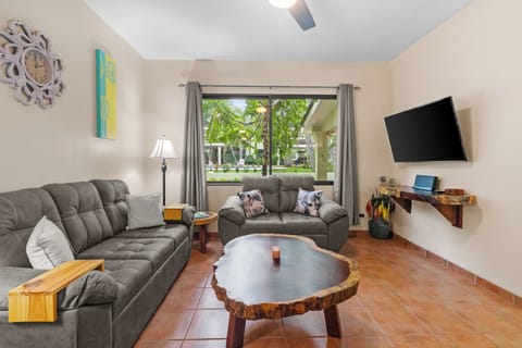 The condo offers a comfy living room with 50" Smart TV.  