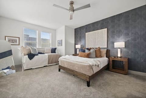 Bedroom Retreat: Bright and stylish sanctuary with plush bedding and modern decor awaits your relaxation!