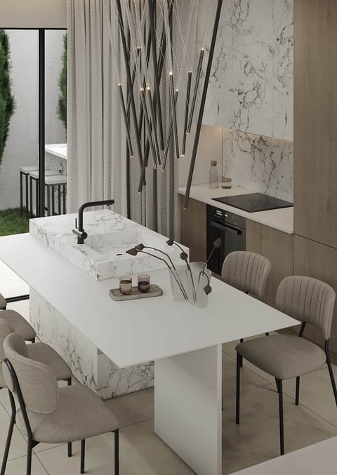 Textures of wood, marble, and linen, the Villa Athos design philosophy.