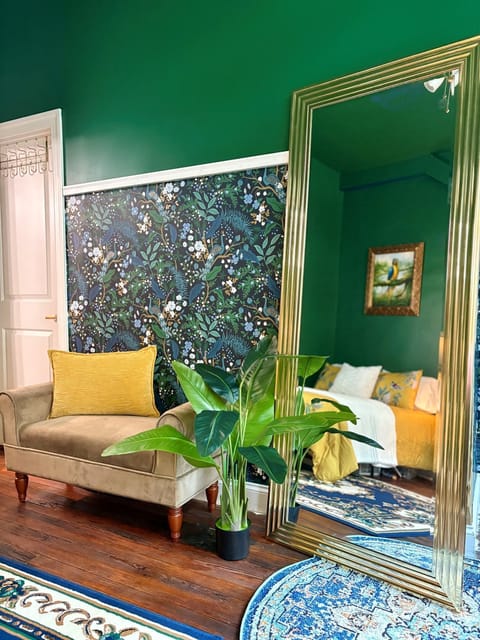 Gorgeous art deco bedroom with full size mirror and lighted closet
