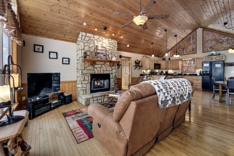 Front porch with rocking chairs at Dream Weaver cabin in a gated community near Bryson City.