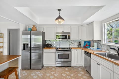 You won't believe how well stocked for large group entertaining this kitchen is!
