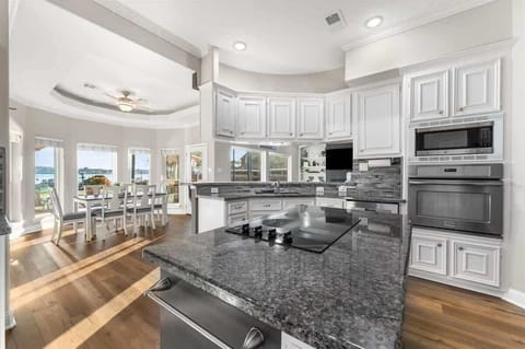 Stainless steel appliances, lots of counter space, and an attached breakfast nook.
