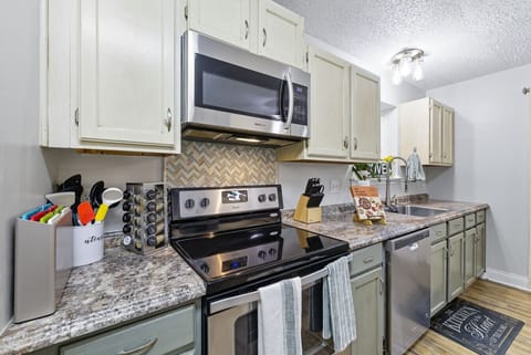 Kitchen | Stainless Steel Appliances | Open to Dining Area
