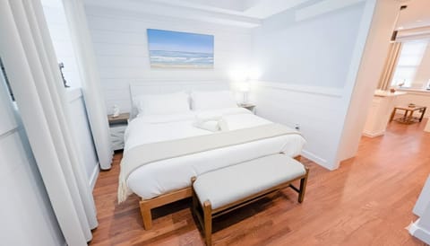 King bed provided with linens