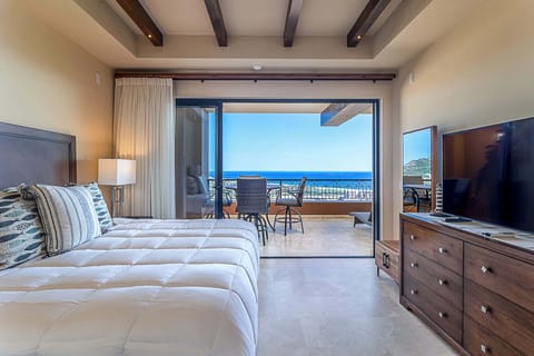 Master bedroom with balcony access.