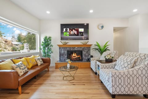 Bright living room with yellow accents and balcony for cozy relaxation