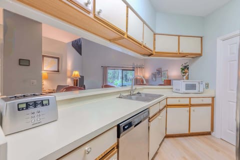 Well-equipped kitchen offering generous counter space for meal prep.