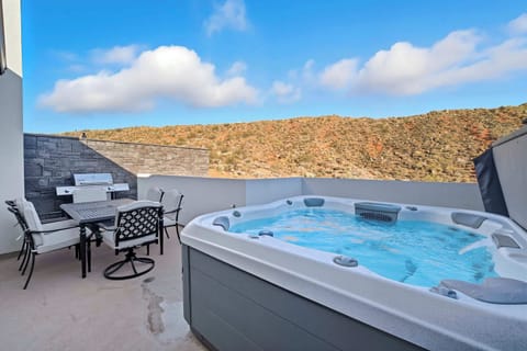 Soak up the views from your private top-deck hot tub!