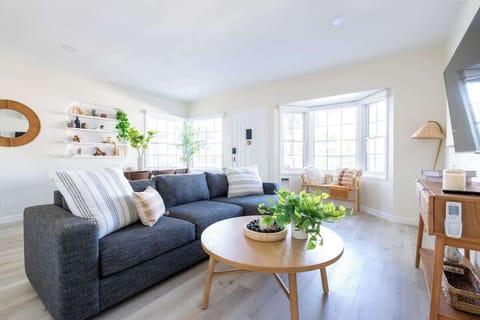 The sun-soaked living room invites you to relax and unwind