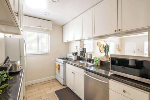 Sit up at the serve through breakfast bar and keep the chef company