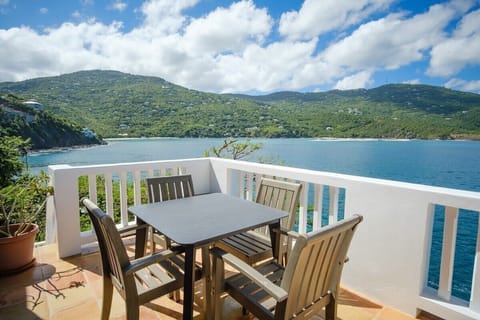 Outdoor dining area. It can get warm in the evenings but is perfect to enjoy a morning cup of coffee at.