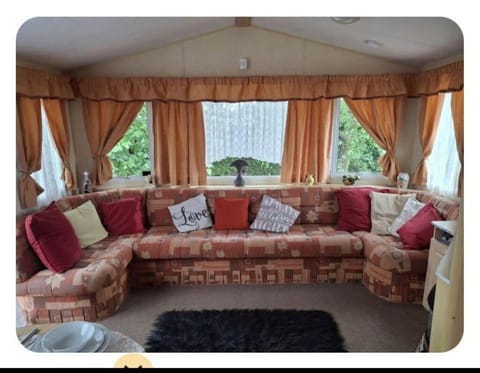 Cozy living room with panoramic windows and plush seating
