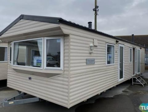 Cozy exterior of a charming, modern mobile home retreat