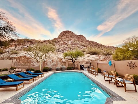 Backyard at sunrise. The sun rises over the mountain.