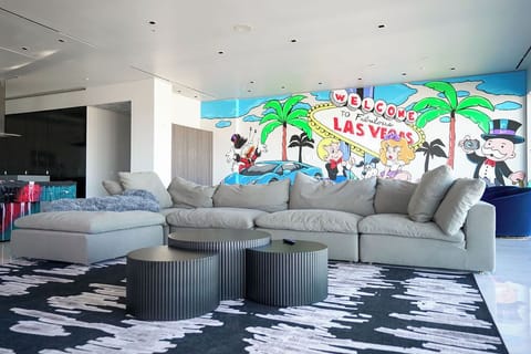 The stylish sofa offers a cozy spot to relax, whether you're reading, 