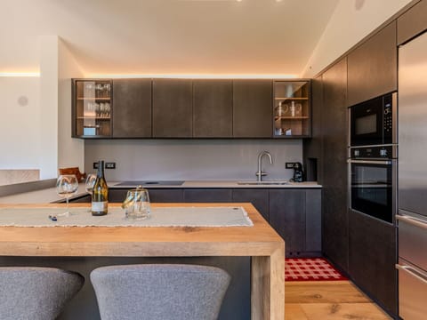 Furniture, Kitchen, Interior Design, Countertop, Flooring, Wood, Cabinetry, Kitchen Appliance, Ceiling, Floor