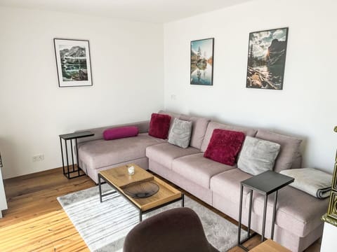 Furniture, Interior Design, Flooring, Floor, Couch, Wood, Living Room, Table, Wood Flooring, Room