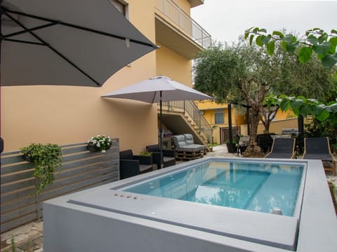 Swimming Pool, Outdoor Furniture, Composite Material, Resort, Eco Hotel, Shade, Chair, Umbrella, Courtyard, Water Feature