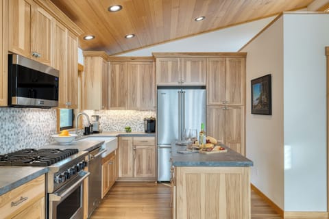 The kitchen is fully stocked with reliable appliances and utensils.