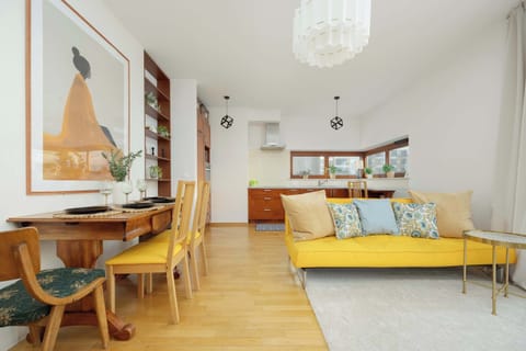 Spacious living and dining area with a relaxing, neutral palette.