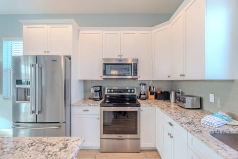 Modern kitchen that has everything you need for your stay. First floor