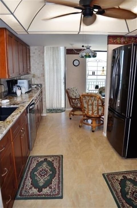 Kitchen has been recently updated with granite and stainless
