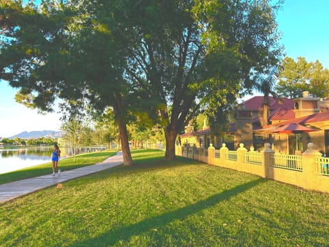 Your Villa  fronts on McCormick Lake & 28 Mile Path with Mountain Background