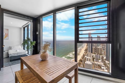 Spacious glass-lined balcony offering sweeping coastal and skyline views — an unbeatable spot to relax and take in the Gold Coast.