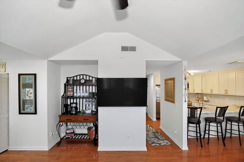 Relax in a sun-filled space with comfortable seating and smart TV