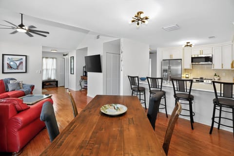 Seamlessly connected living, dining, and kitchen area perfect for unwinding