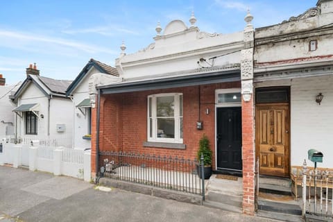 FRONT: Behind this classic Victorian facade is a fully renovated 3 Bedroom (Q, Q, D) that comfortable sleeps up to six with 2.5 bathrooms including a bath. It has a separate lounge, dining room and kitchen with a sunny rear outdoor living space.