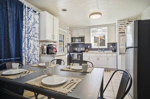 Dining space open to the kitchen so the whole family can gather.