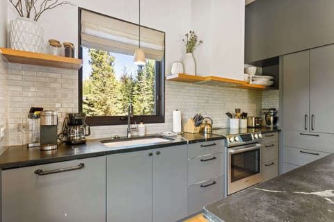 Kitchen: Drip coffee maker, Keurig, Crockpot, blender, waffle maker, food processor, cooking utensils, tableware