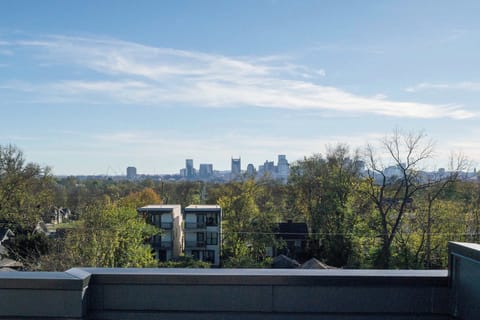 Enjoy Nashville's stunning skyline from your private rooftop oasis. Perfect for groups or family reunions, this luxurious rental offers upscale amenities and unforgettable city views for an ideal Music City getaway.