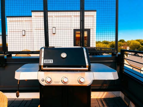 Fire up the grill and enjoy stunning skyline views from the rooftop of this luxurious Nashville vacation home! Perfect for gatherings, it's your ultimate getaway spot for fun in Music City. Book your stay with Misfit Homes today!