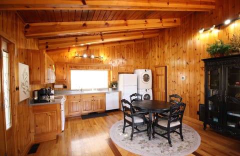 Updated kitchen with cabinets full of dishes, pots, pans, utensils and more to assist with meals large and small