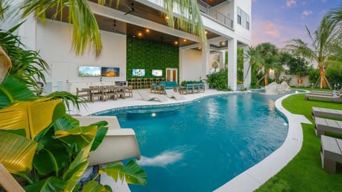 Twilight - Pool Area - Over the Top - Resort Style Pool - Waterslide - Seating - Dining
