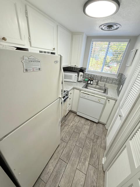 Floor, Appliance, Refrigerator, Indoors, Microwave