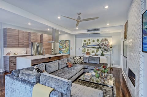Bright, open living space with natural light, Smart TV, and free Wi-Fi just minutes from Uptown Charlotte.