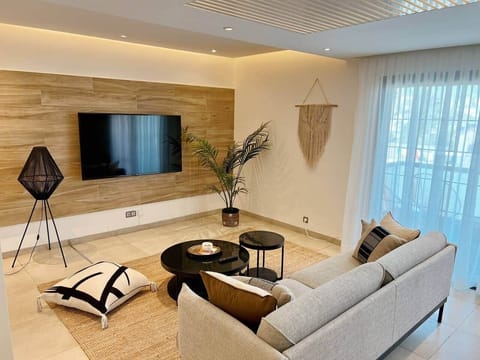 Relax and recharge in our welcoming lounge, a true oasis where natural colors and soothing textures create a serene refuge inspired by nature.
