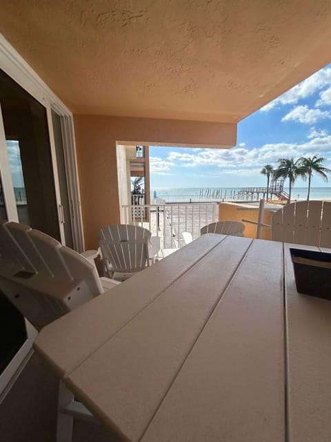 PATIO WITH AMISH FURNITURE, DINE AT RAISED TABLE OR LOUNGE IN THE SLIDER ROCKERS