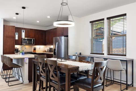 Bright dining space with modern seating and natural light throughout!