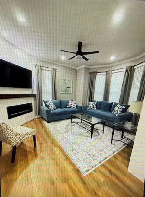 Living Room w/ TV & Electric Fireplace