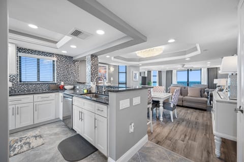 Open Kitchen & Living Area surrounded by water views!