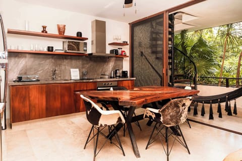 Dining Room Next to Terrace and Kitchen