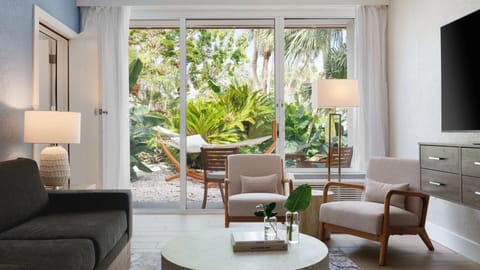 Sip morning coffee as garden views fill the room.